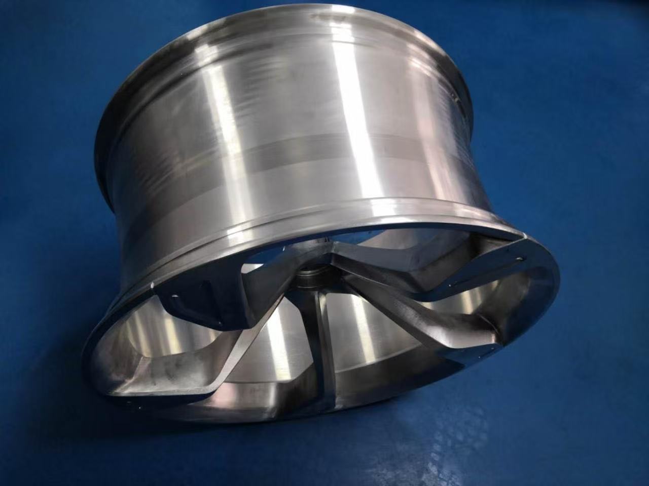 Finished precision metal component