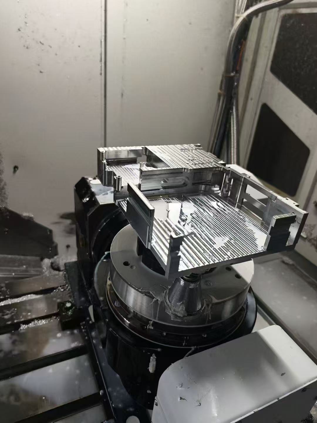 Complex CNC component in machining setup